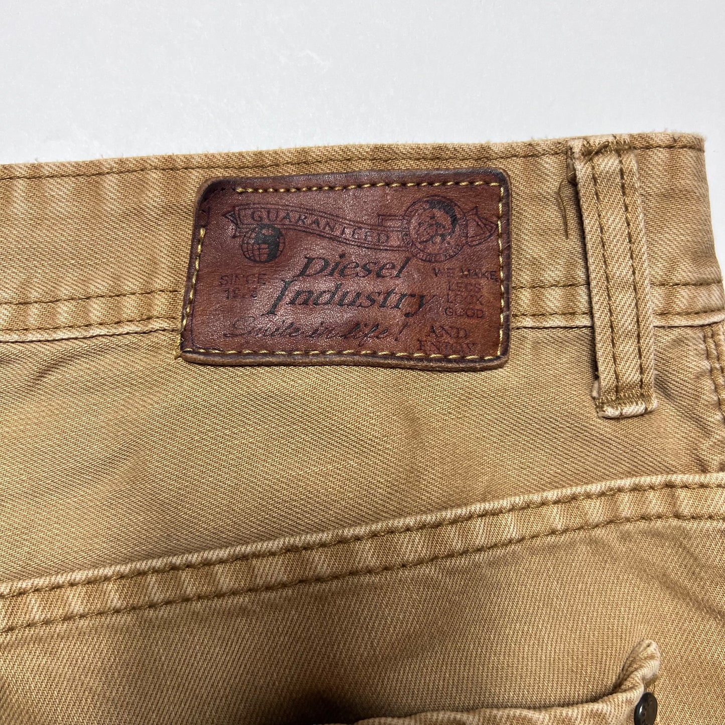 Vintage Diesel Straight Fit Brown Jeans 36/30 - Cats on Stacks VNTG