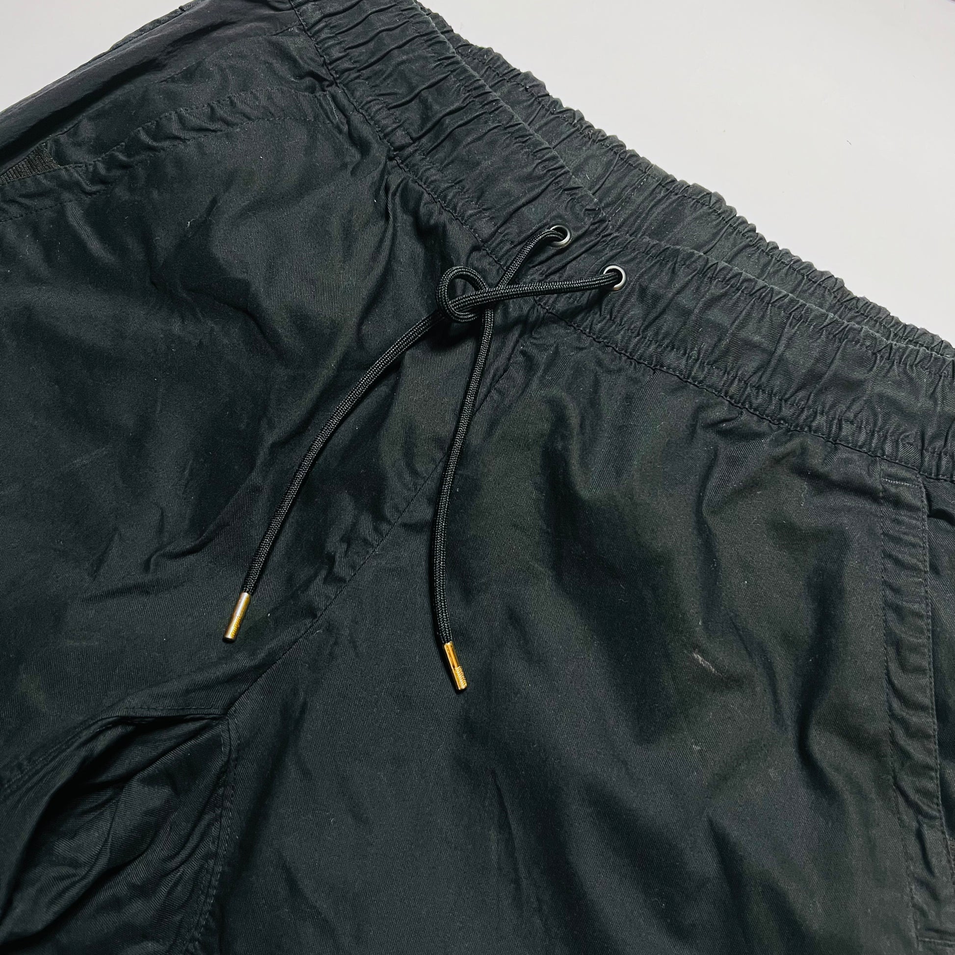 Nike F.C. Cargo Pants Hose Tapered Fit schwarz L - Cats on Stacks VNTG