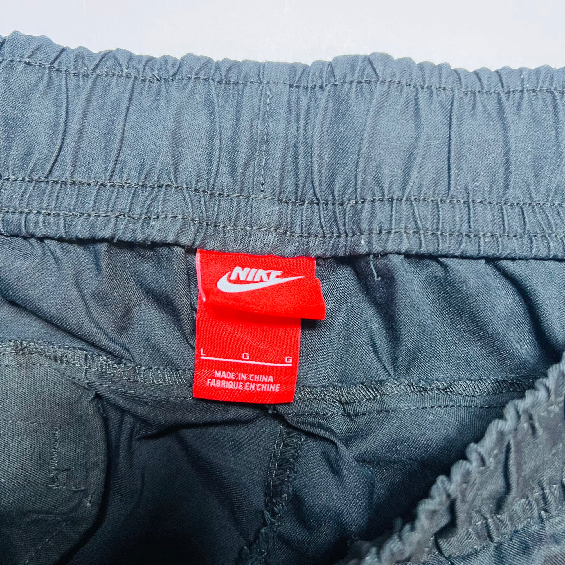 Nike F.C. Cargo Pants Hose Tapered Fit schwarz L - Cats on Stacks VNTG